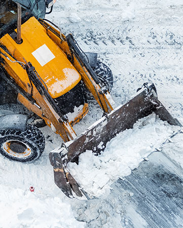 Take Precautions When Driving Near Snow Plows